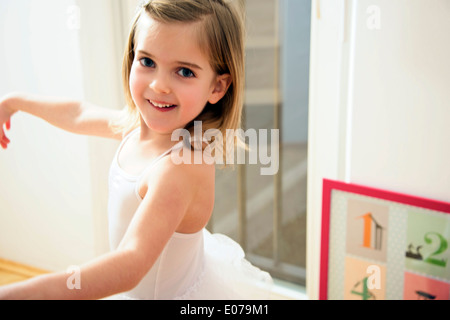 Little Ballerina doing exercises Stock Photo