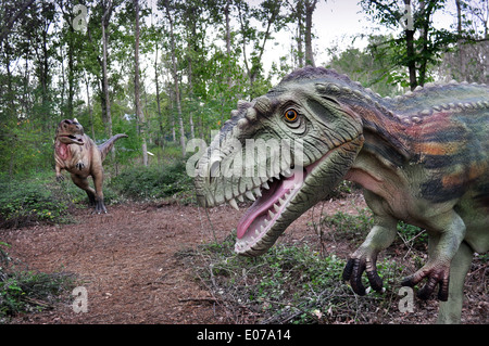 Velociraptor attacking a dinosaur. Realistic reconstruction Stock Photo