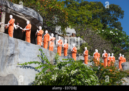 Plaster pilgrims on the hillside by the Golden Temple in Dambulla, Sri Lanka 2 Stock Photo