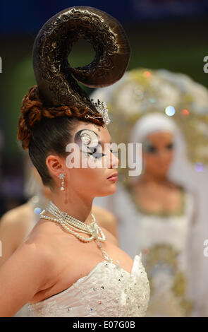 Frankfurt Main, Germany. 05th May, 2014. Female models present hairstyles on the runway after the 'Bridal make-up' competition of the world hairdressing championships at Festhalle in Frankfurt Main, Germany, 05 May 2014. More than 1,000 participants from 50 countries will compete in the championship. Photo: ARNE DEDERT/DPA/Alamy Live News Stock Photo