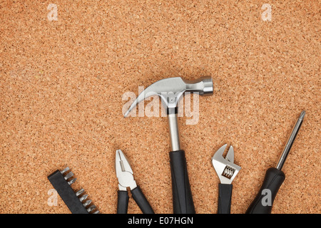 Set of tools on cork panel background with copy space Stock Photo