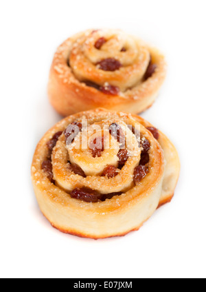 Two swirl buns with raisins and brown sugar, isolated on white Stock Photo