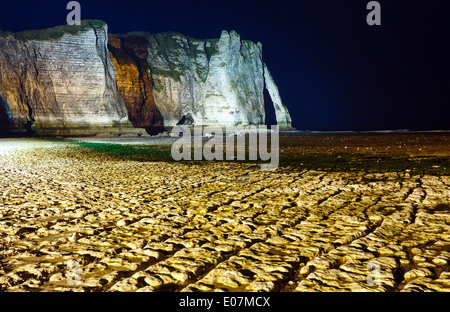 One of the three famous white cliffs known as the Falaise de Aval. Etretat, France. Night scene. March 2014. Stock Photo