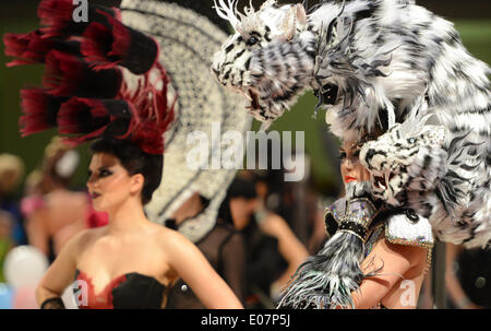 Frankfurt Main, Germany. 05th May, 2014. Two female models present hairstyles in the 'Fantasy hairstyle' competition of the world hairdressing championships at Festhalle in Frankfurt Main, Germany, 05 May 2014. More than 1,000 participants from 50 countries will compete in the championship. Photo: ARNE DEDERT/DPA/Alamy Live News Stock Photo
