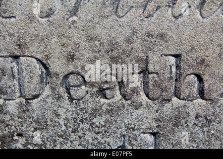 'Death' the word is part of an inscription on a 19th century gravestone in a churchyard somewhere in Mid Wales UK Stock Photo