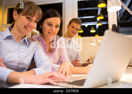 Business man woman colleagues computer startup coworking casual students Stock Photo