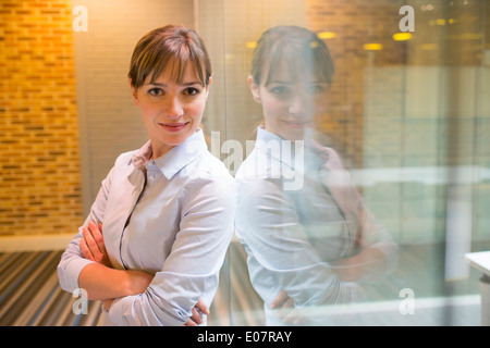 Female business startup looking camera student Stock Photo