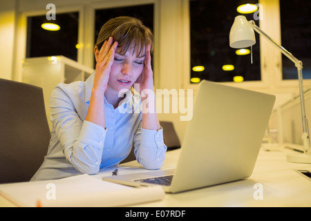 Female business tired working late startup student desk Stock Photo