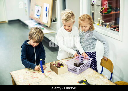 Kindergarten students in art class Stock Photo