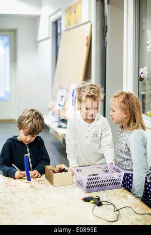 Students in art class at kindergarten Stock Photo