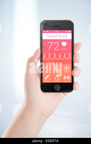 Woman hand is holding black mobile smart phone with health book app on the screen. Stock Photo