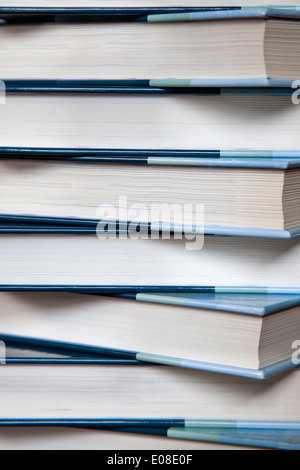 Close up view of a pile of hard cover books. Stock Photo