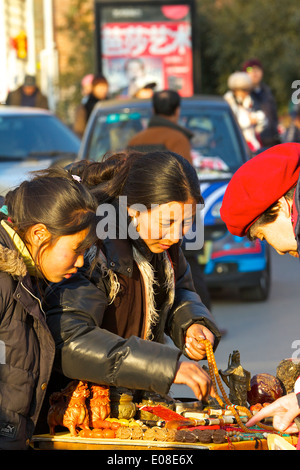 Female Chinese Market Trader in The 798 Art District, Beijing, China. Stock Photo