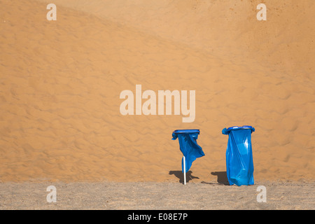 Trash bags on Praia das Bicas beach, Sesimbra, Portugal. Stock Photo