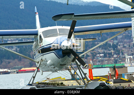 Harbour Air Seaplanes Turbo Otter Floatplane Moored In Vancouver Harbour Water Airport, BC, Canada. Stock Photo