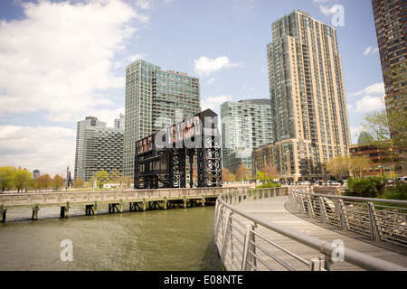 Activities and new development along the East River in Western Queens, seen from Gantry Plaza State Park in New York Stock Photo