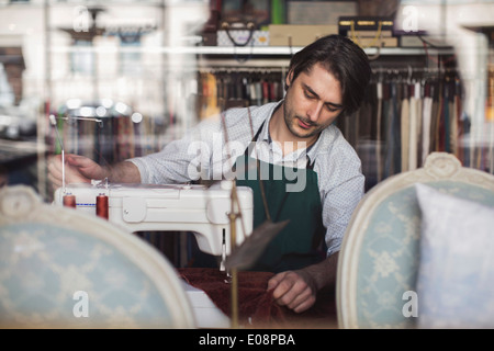 Male tailor working in design studio Stock Photo