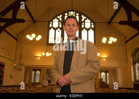 Portrait of a Methodist Church Minister in his church, Liphook, Hampshire, UK. Stock Photo