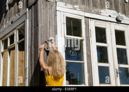 Woman In Ranch Style House Climbing Ladder To Bunk Bed Canvas