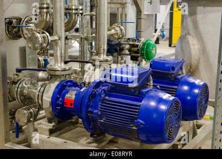 biogas generation equipment pipes and tanks in water treatment facilities plant. Gas process from sludge. Stock Photo