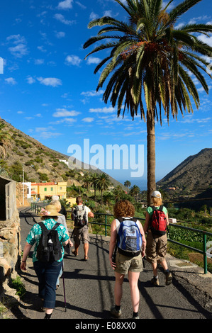 Hikers setting off from Vallehermoso. La Gomera. Canary Islands, province of Santa Cruz de Tenerife. Spain Stock Photo