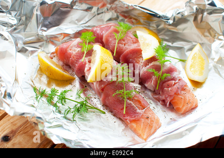 Fresh salmon fillets wrapped with bacon Stock Photo