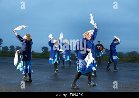 The Glorishears Birmingham Ladies Morris dancing group welcome in the dawn on top of Barr Beacon, Birmingham Stock Photo