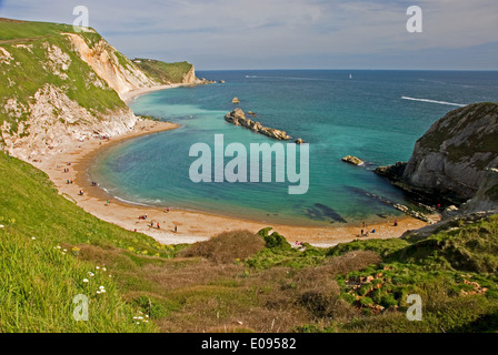Man o War cove adjacent to Durdle Door on the Jurassic Coast in Dorset forms part of a unique section of coastline. Stock Photo