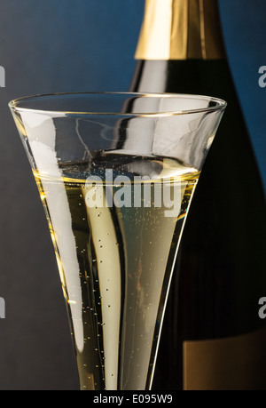 Champagne bottle with champagne glass. Symbolic photo fue celebrations and turns of the year., Champagnerflasche mit Sektglas. S Stock Photo