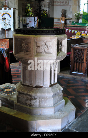 The fifteenth century font in the parish church of All Saints, Winkleigh, Devon, England, UK. Stock Photo