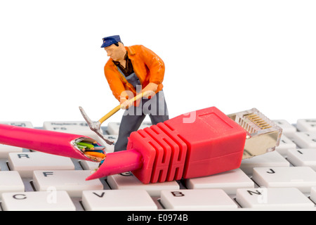 Worker, network plug, keyboard, symbolic photo fue Internet, disturbance, servicing, problem solution,, Arbeiter, Netzwerkstecke Stock Photo