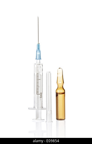 Close up view of  white plastic syringe  on  white back Stock Photo