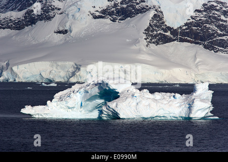 arched iceberg in wilhelmina bay Antarctica Stock Photo