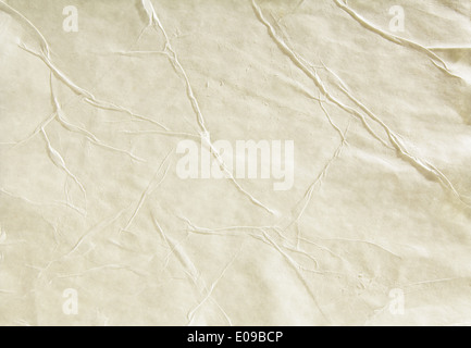 Old sheet of paper folded and battered, with paper texture. Stock Photo