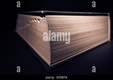 Book against black background Stock Photo