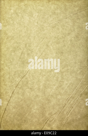 Old sheet of paper folded and battered, with paper texture. Stock Photo