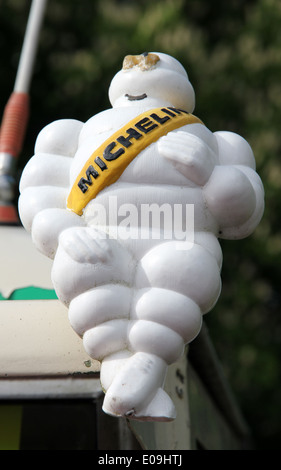 Michelin man model on vehicle at vintage rally Stock Photo