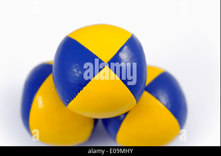 3 Blue and Yellow soft juggling balls Stock Photo