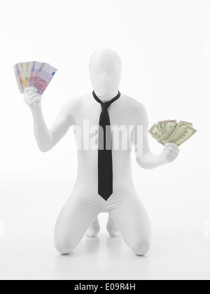 Unknown person dressed in white suit with black tie holding euro and dollar bills in his hands Stock Photo