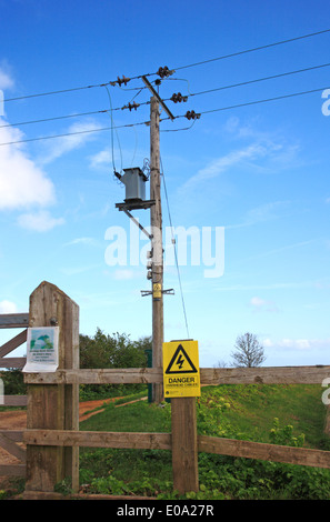 A pole carrying electricity cables on the North Norfolk coast at Cley next the Sea, Norfolk, England, United Kingdom. Stock Photo