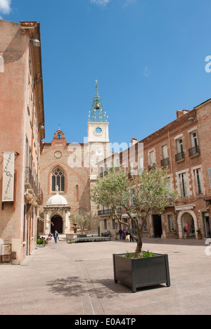 Perpignan's Leon Gambetta square is dominated by red brick houses and the catheral of Jean Baptiste; France Stock Photo