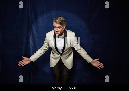 Male entertainer bowing Stock Photo