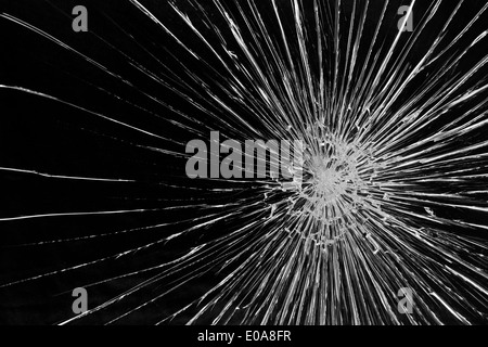 Cracked glass against a black background Stock Photo