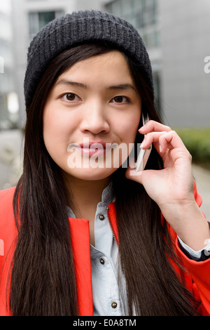 Close up of woman using cellular phone Stock Photo