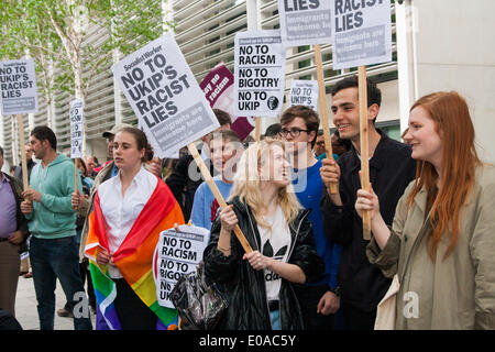 London, May 7th 2014. Anti-fascist protesters demonstrate outside the Emmanuel Centre in Westminster as  ticketholders queue, prior to the arrival of Nigel Farrage who was to address their London rally. Credit:  Paul Davey/Alamy Live News Stock Photo