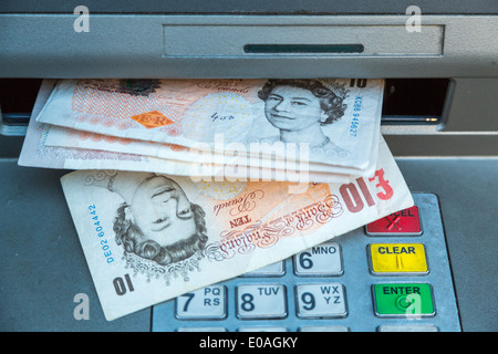 Old Ten pound notes,  now withdrawn in March 2018 ,replaced by new polymer notes, dispensed from a cash machine ATM London England UK Stock Photo