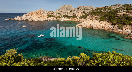 Italy Sardinia Capo Testa Cala Spinosa, sand beach with cristal clear water surrounded by bizarre rocks Stock Photo