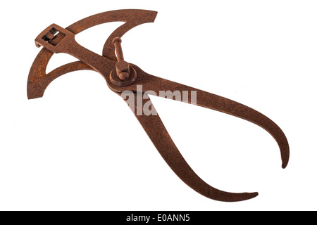 an ancient and rusty caliper isolated over a white background Stock Photo