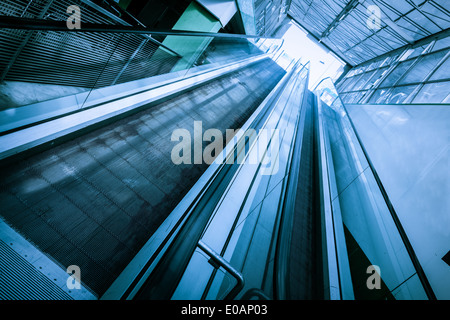 two escalators in a mall or in an airport Stock Photo