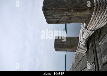 Rope wrapped around mooring posts on the stern of a boat Stock Photo ...